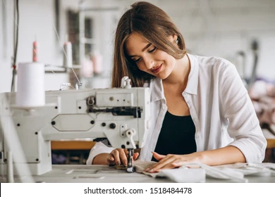woman tailor working sewing factory 260nw 1518484478
